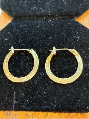 14 k Gold Pounded Hoop Earrings - .
.51 Grams